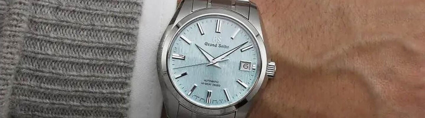 Gent wearing Grand Seiko with Snowflake White Dial